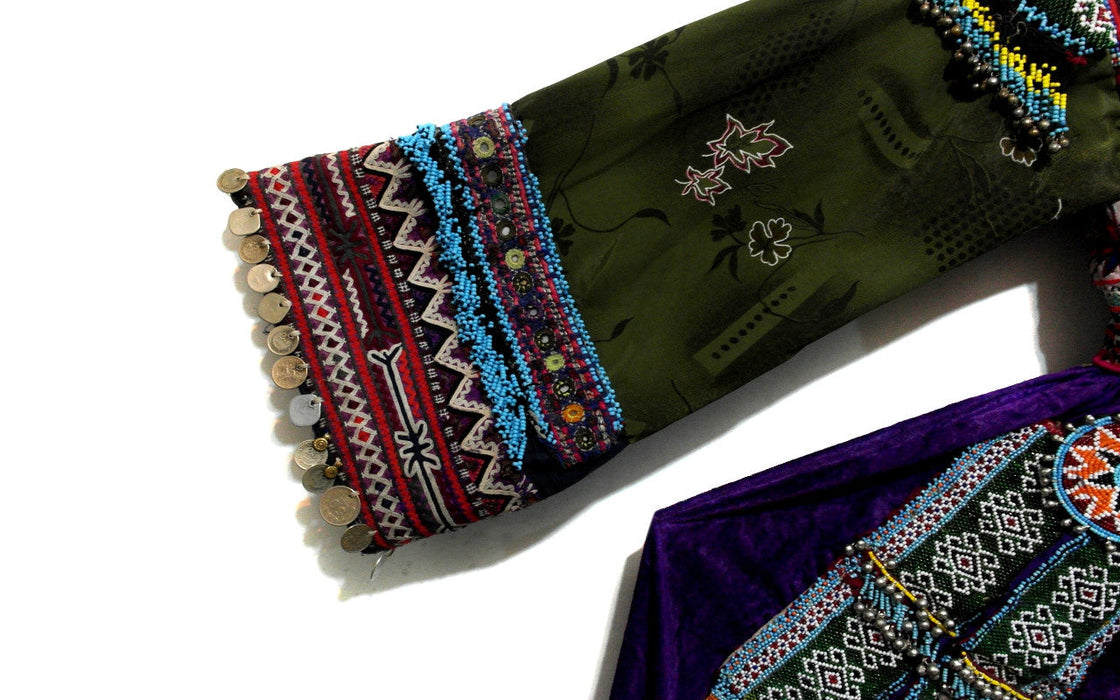 kuchi women long frocks with handmade embroidery work