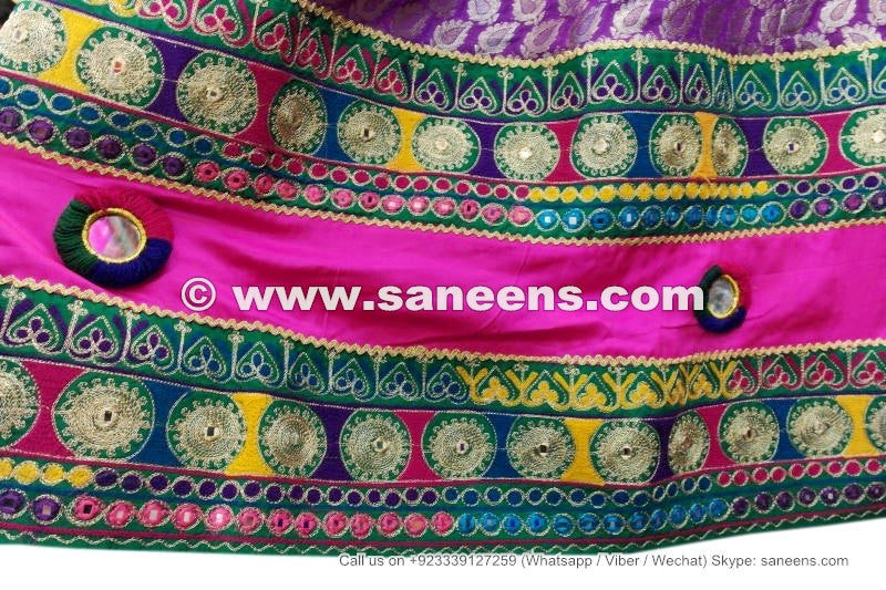 traditional muslim persian pashtun dress with medallions