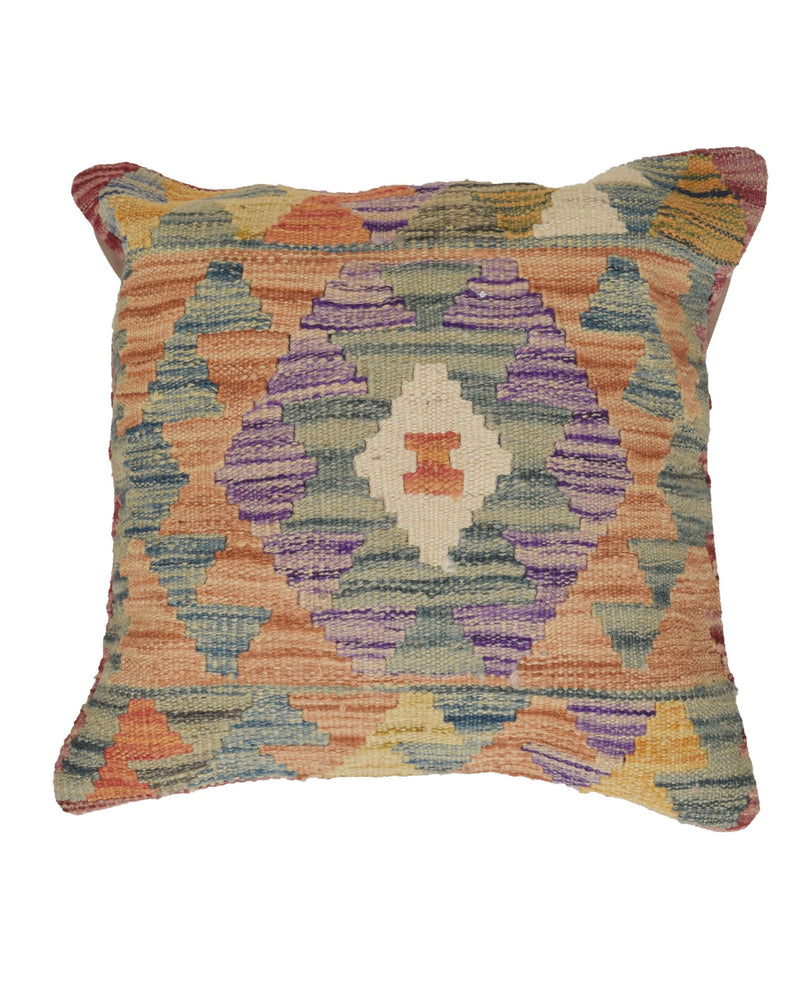 Multicolored patterned pillow on a white background
