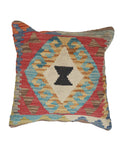 Decorative pillow with geometric pattern on a white background