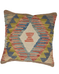 Decorative pillow with geometric pattern on a white background