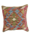 Multicolored patterned pillow on a white background