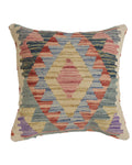 Decorative pillow with geometric pattern on a white background