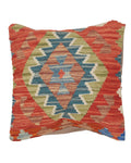 Decorative pillow with geometric pattern on a white background