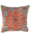 Decorative pillow with geometric pattern on a white background