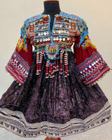 Kuchi Ethnic Dress In Shiny Purple Fabric