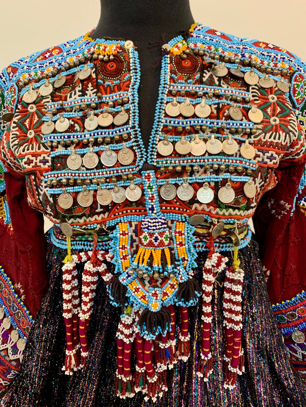 Kuchi Ethnic Dress In Shiny Purple Fabric