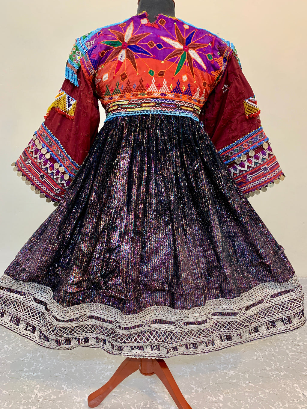 Kuchi Ethnic Dress In Shiny Purple Fabric