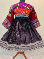 Kuchi Ethnic Dress In Shiny Purple Fabric