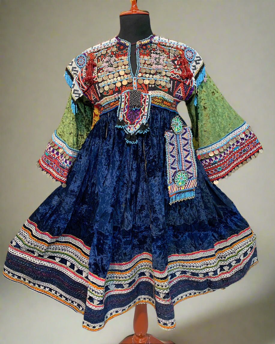 Colorful embroidered textiles on a wooden surface