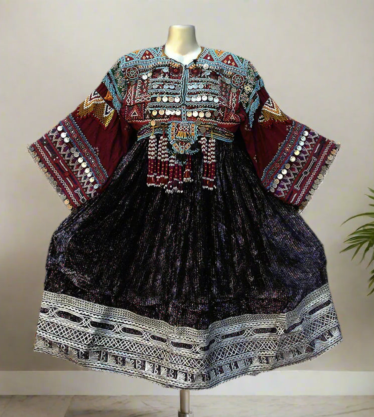 Kuchi Ethnic Dress In Shiny Purple Fabric