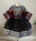 Kuchi Ethnic Dress In Shiny Purple Fabric