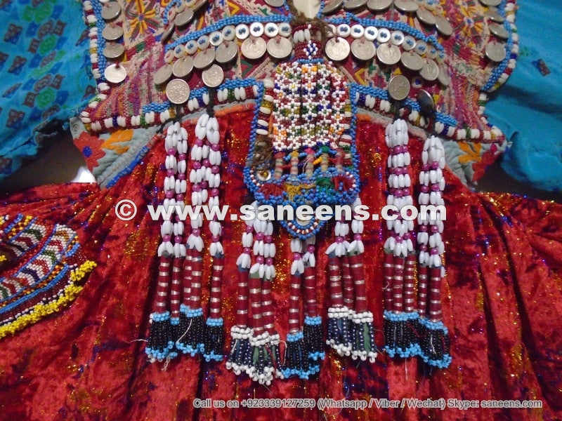 traditional kuchi beads work dress with tassels