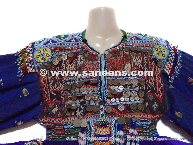 kuchi artwork coins couture frock