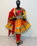 Colorful traditional outfit on a mannequin against a white background