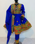 Traditional blue outfit with colorful embroidery on a mannequin against a white background