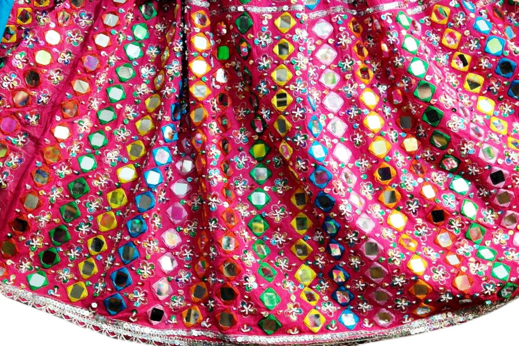 lots of mirror work on afghan dresses