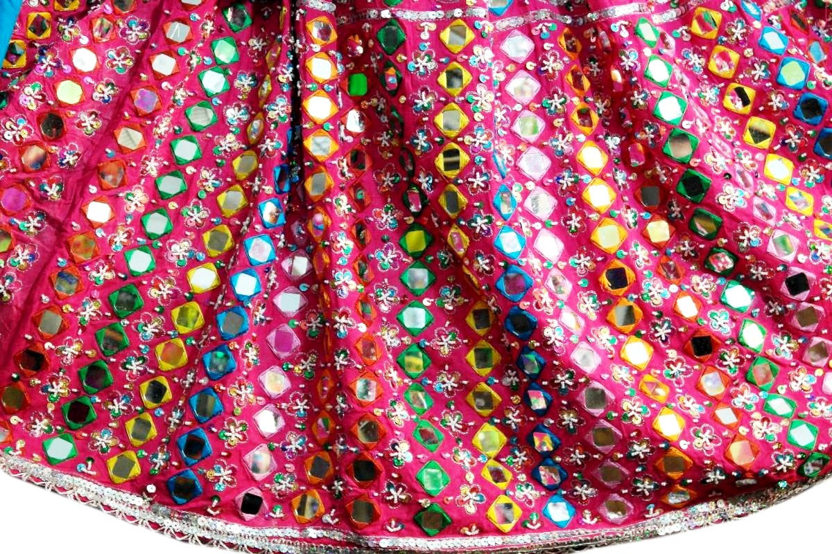 lots of mirror work on afghan dresses