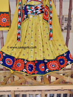 traditional kuchi style yellow gown