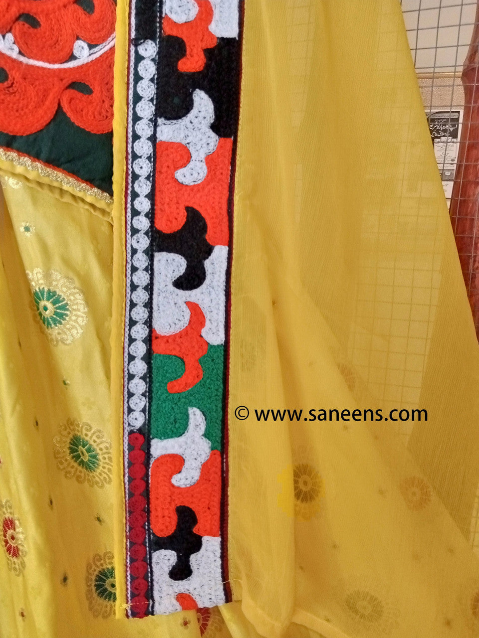 new afghan fashion clothes by saneens in yellow color