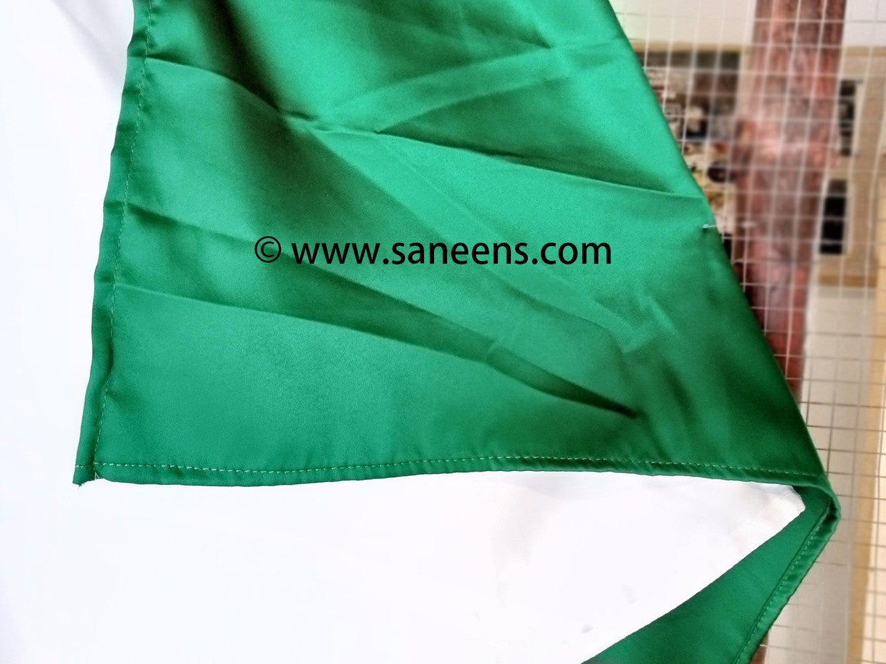 saneens white and green suit