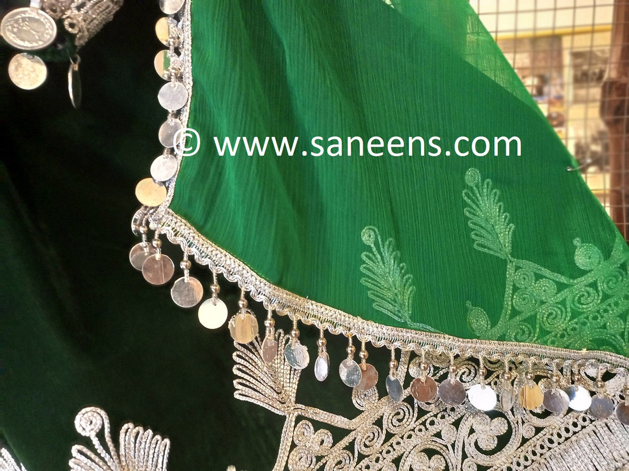 afghan couple clothe  in dark green color