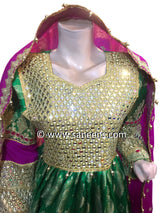 Traditional afghan cultural mirror work weddings dress on green color