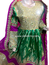 Traditional afghan cultural mirror work weddings dress on green color