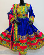 Colorful traditional outfit with a blue and red dress on a mannequin against a white background