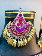 afghan tribal style tiki pendant with pink stones